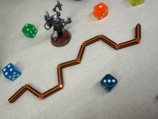 Regla flexible para juegos de escaramuza y wargames